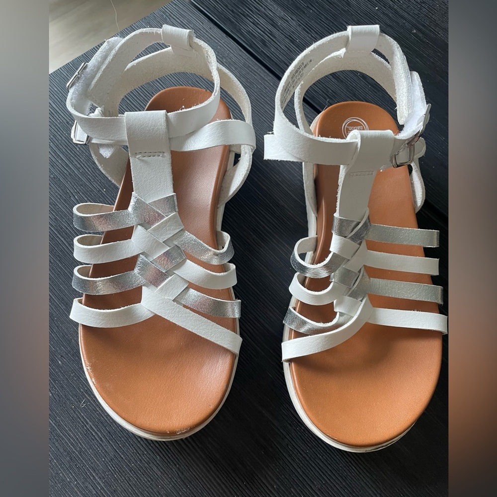 12C gladiator sandals.